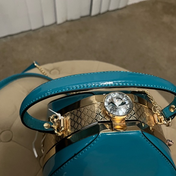 Elegant Teal Handbag
**Never used** - Picture 8 of 8